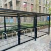 ral black cycle shelter with toastracks installed outside