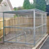 10 space cycle shelter with mesh fencing outside