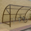 8 space original cycle shelter with galvanised Sheffield stands and bike secured