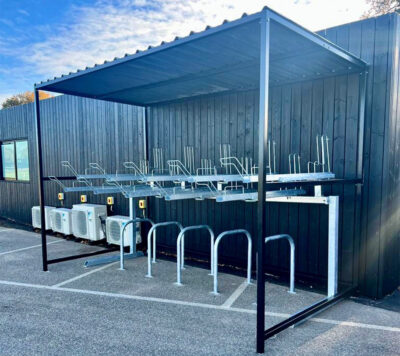 black steel bike shelter with two tier rack installed