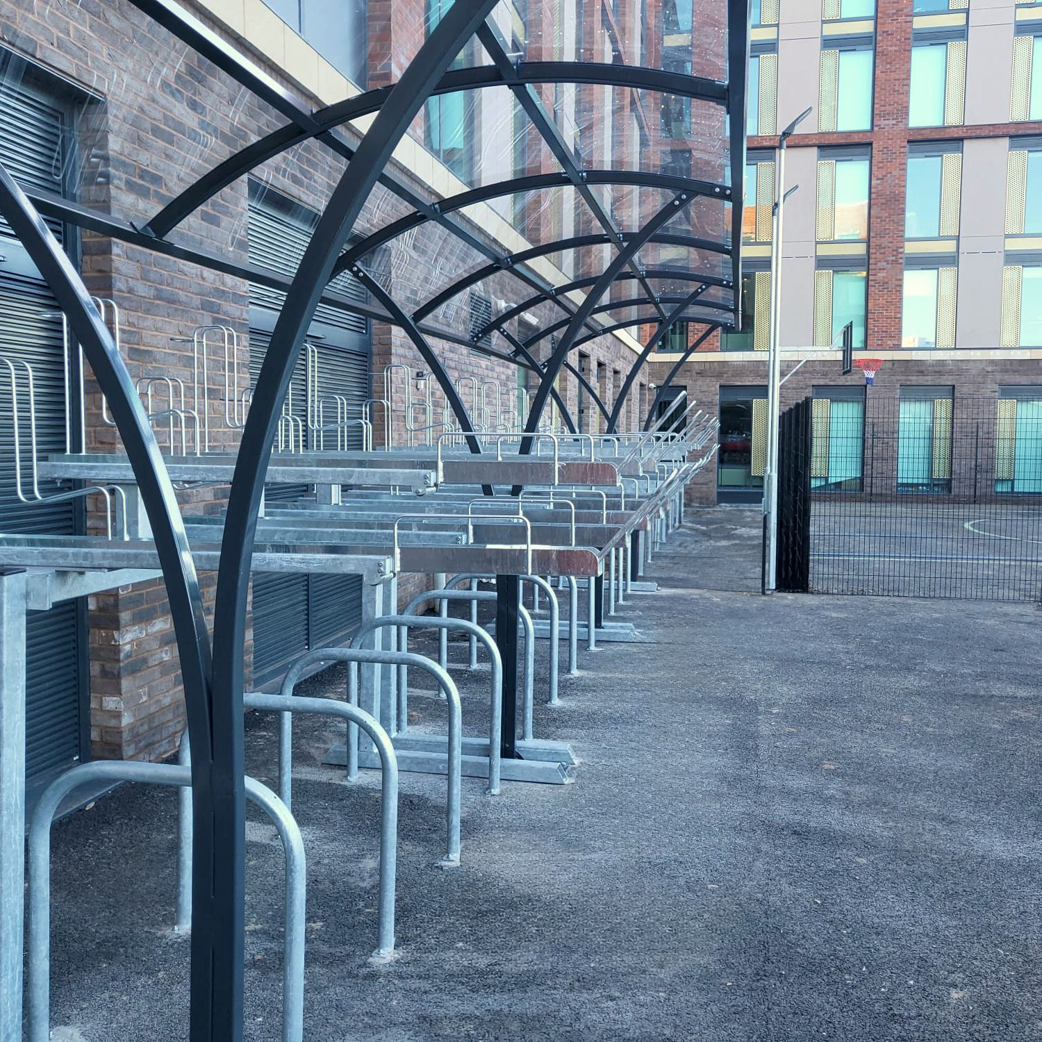 20 space Chelsea two-tier cycle shelter with black RAL and galvanised Sheffield stands