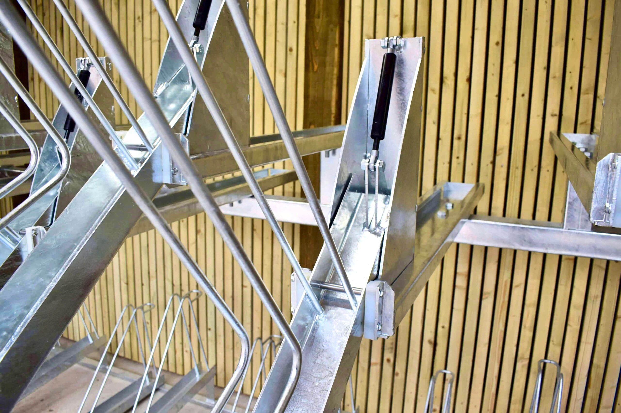 close-up of gas strut on the two-tier gas assisted bike rack