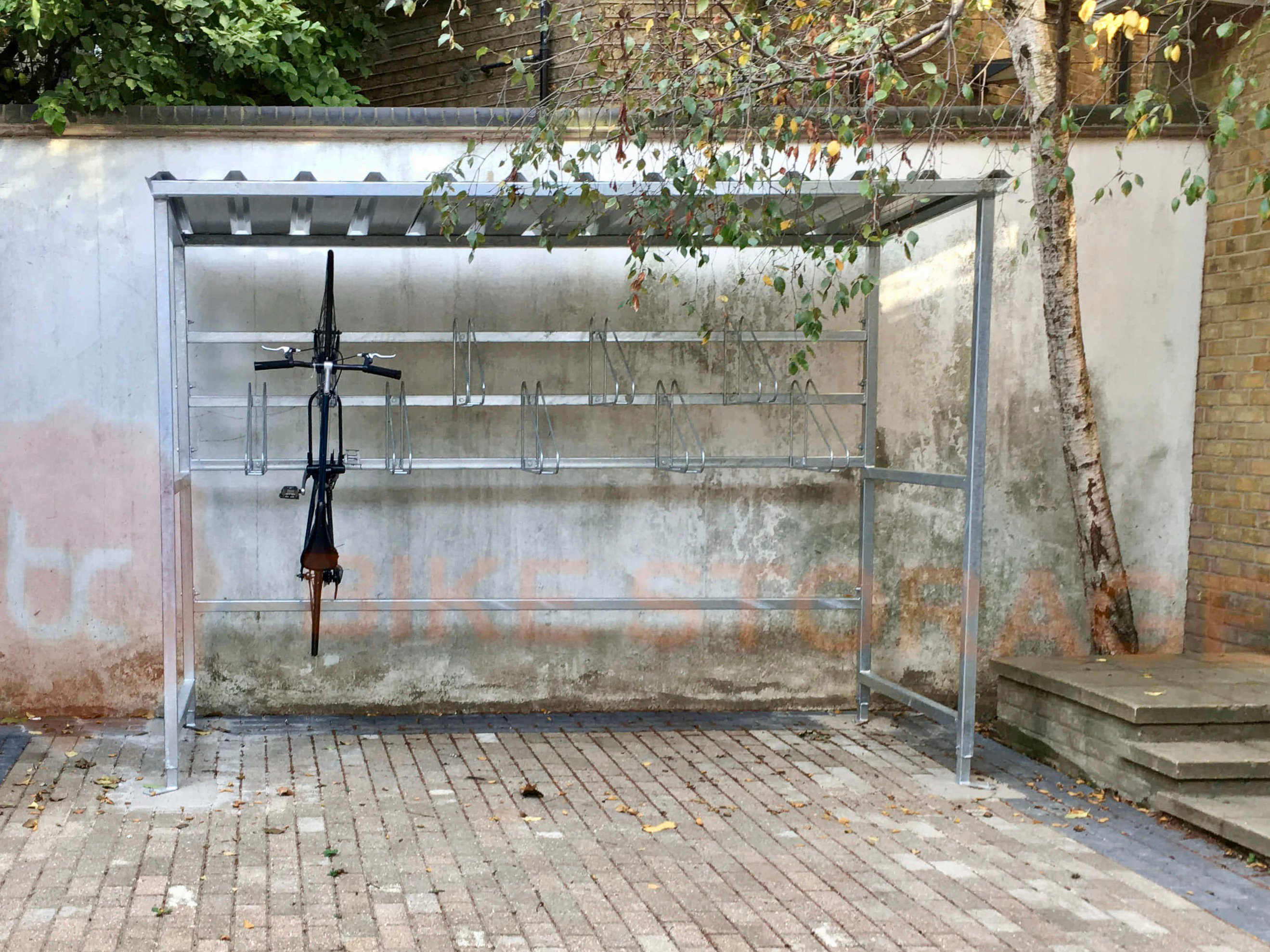 9 space vertical bike hanger shelter with bike secured