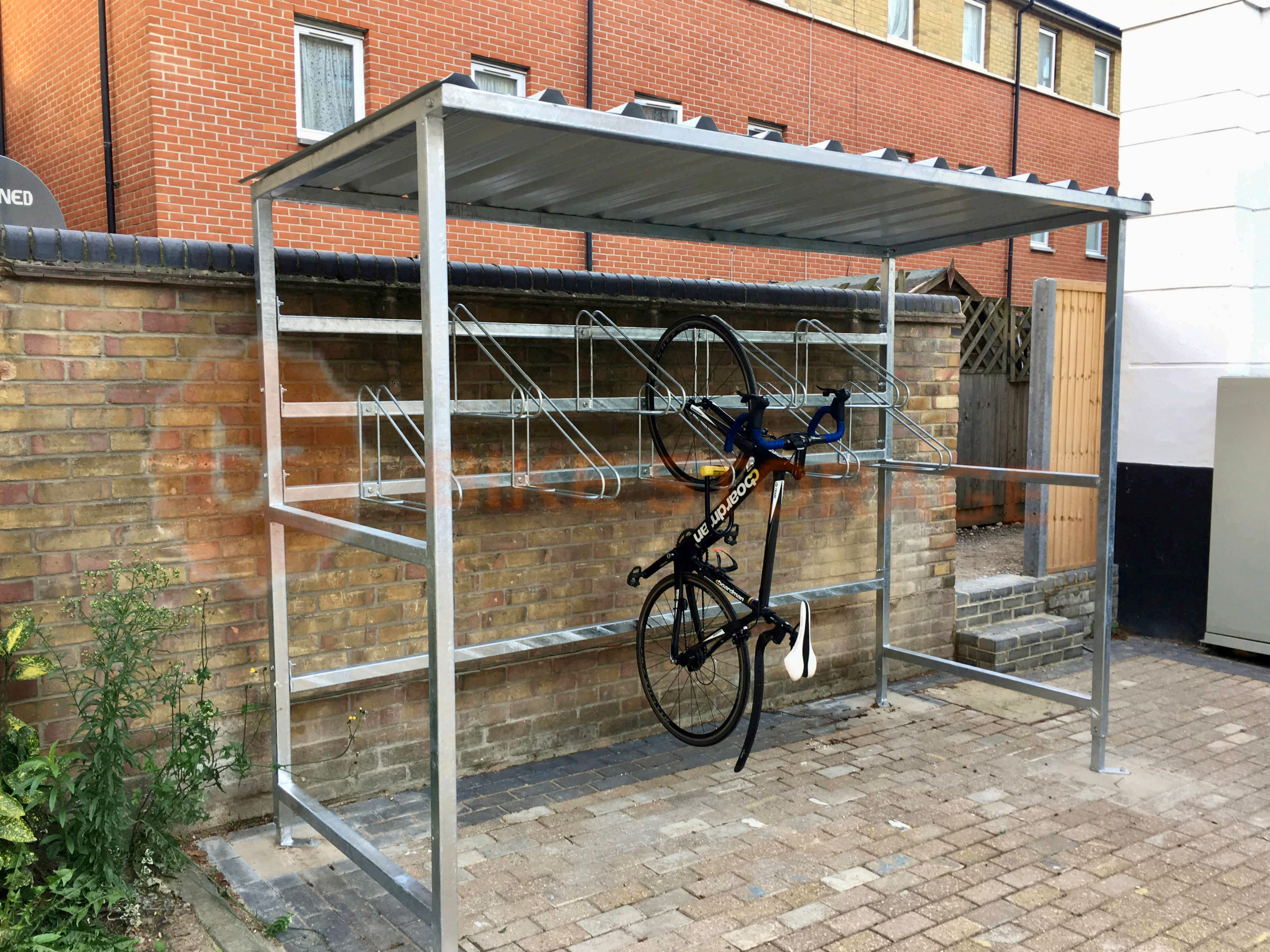 8 space vertical bike hanger shelter with bike secured