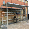 vertical bike shelter with bike hanging up securely