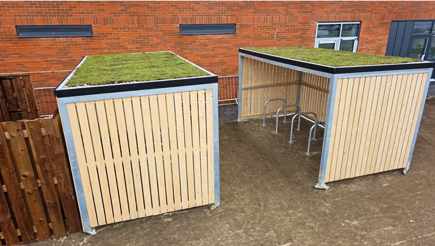 10 space Amazon eco cycle shelter with sedum roof and Sheffield galvanised cycle stand