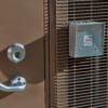 Close up of mesh fencing on Carlton Shelter bike enclosure with electronic lock