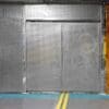 Perforated Mesh Fencing with a Bike Motif on the mesh swing door installed in an underground cycle storage facility