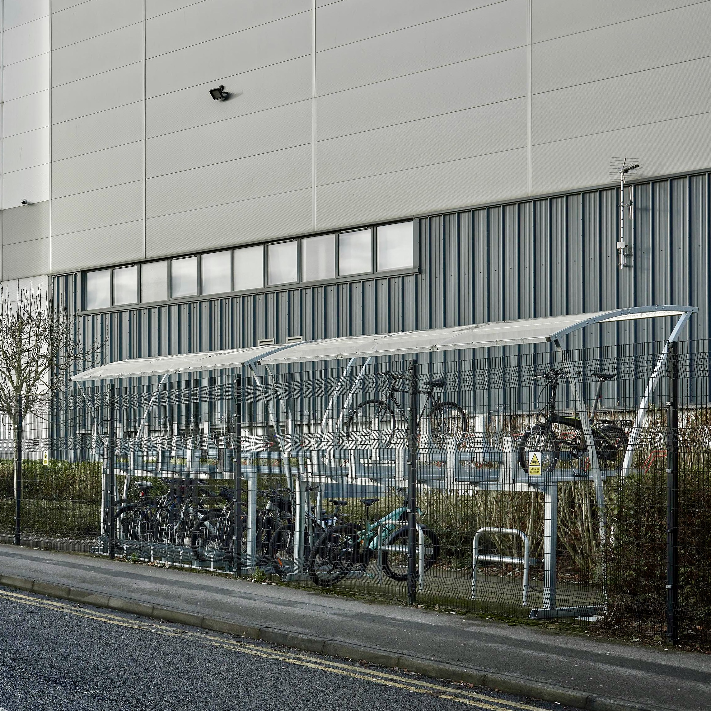 20 space Chelsea two-tier cycle shelter and Galvanised Crossbar Cycle Stand