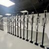 Row of Premium Solo Vertical Bike Racks installed in an underground cycle storage facility
