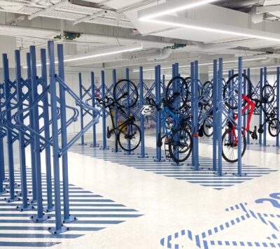 A commercial room with premium solo vertical bike racks
