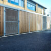 wooden cycle shelter with mesh swing door
