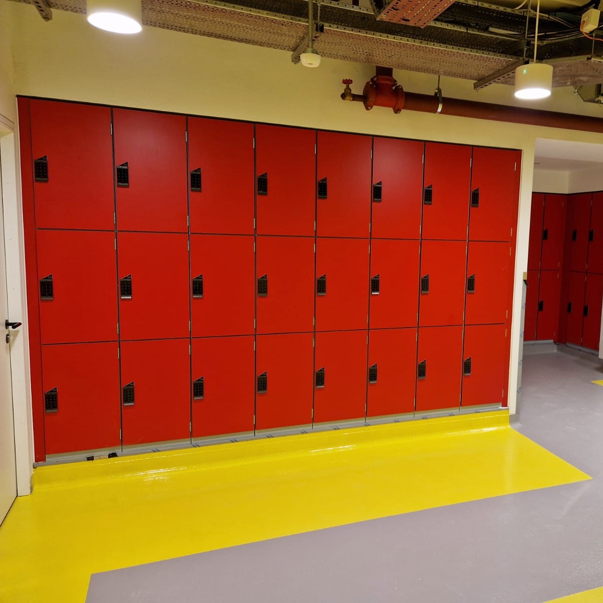 A row of red Islington lockers