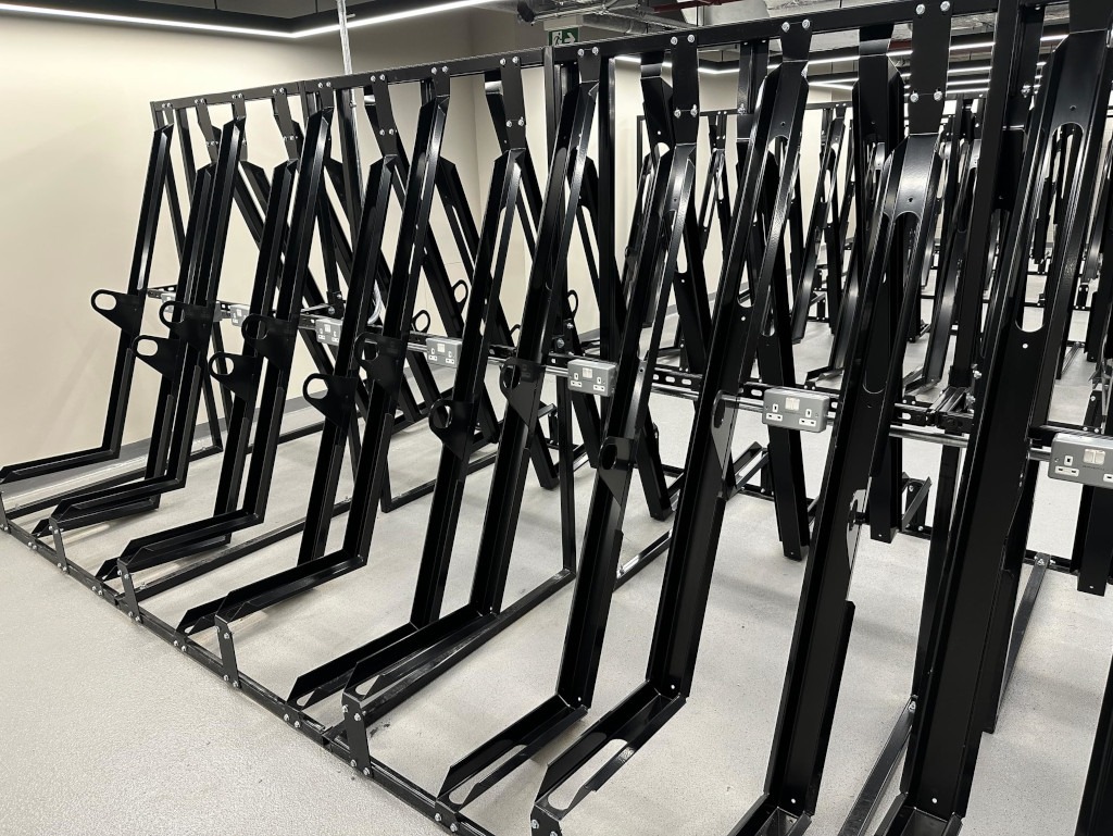 semi vertical e bike racks in an internal store, powder coated black