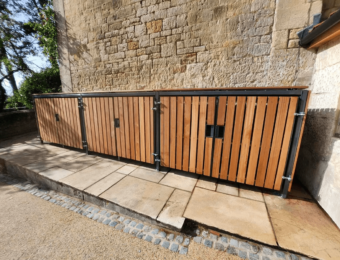 wood cladding premium amazon eco cycle locker outside on a residential property