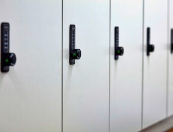 end of trip white hardwood clothing locker with black locks
