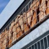 Close up of the habitat panel shelter with mesh cladding installed in an commercial setting