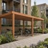 Sapele timber bike shelter with open sides infront of modern flat development