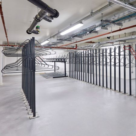 solo vertical bike racks stored in underground cycle storage