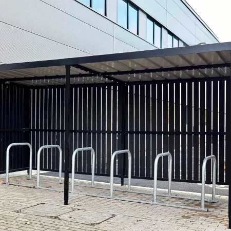 Toastrack Cycle Rack installed within a wooden cycle shelter outside